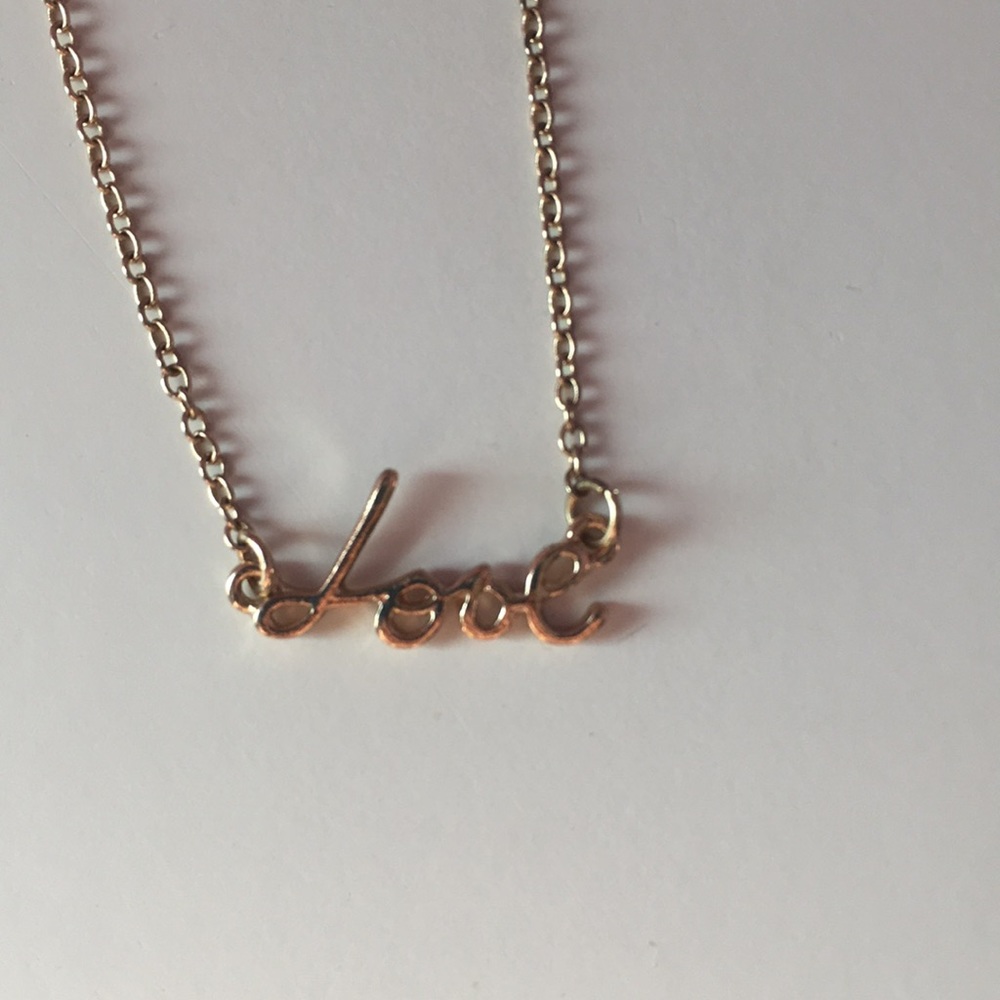Gold “Love” necklace